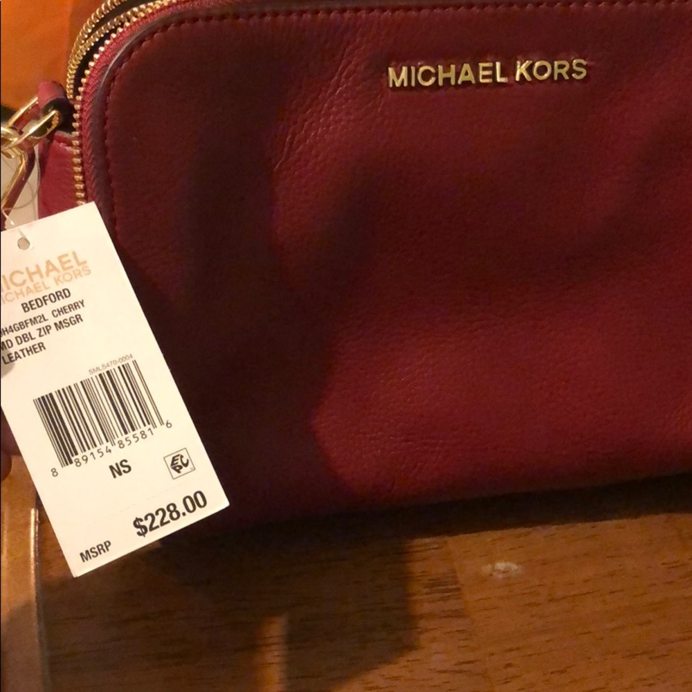 Red Michael Kors cross body bag